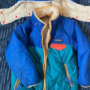 Patagonia Blue and Teal Jacket with Orange Accents